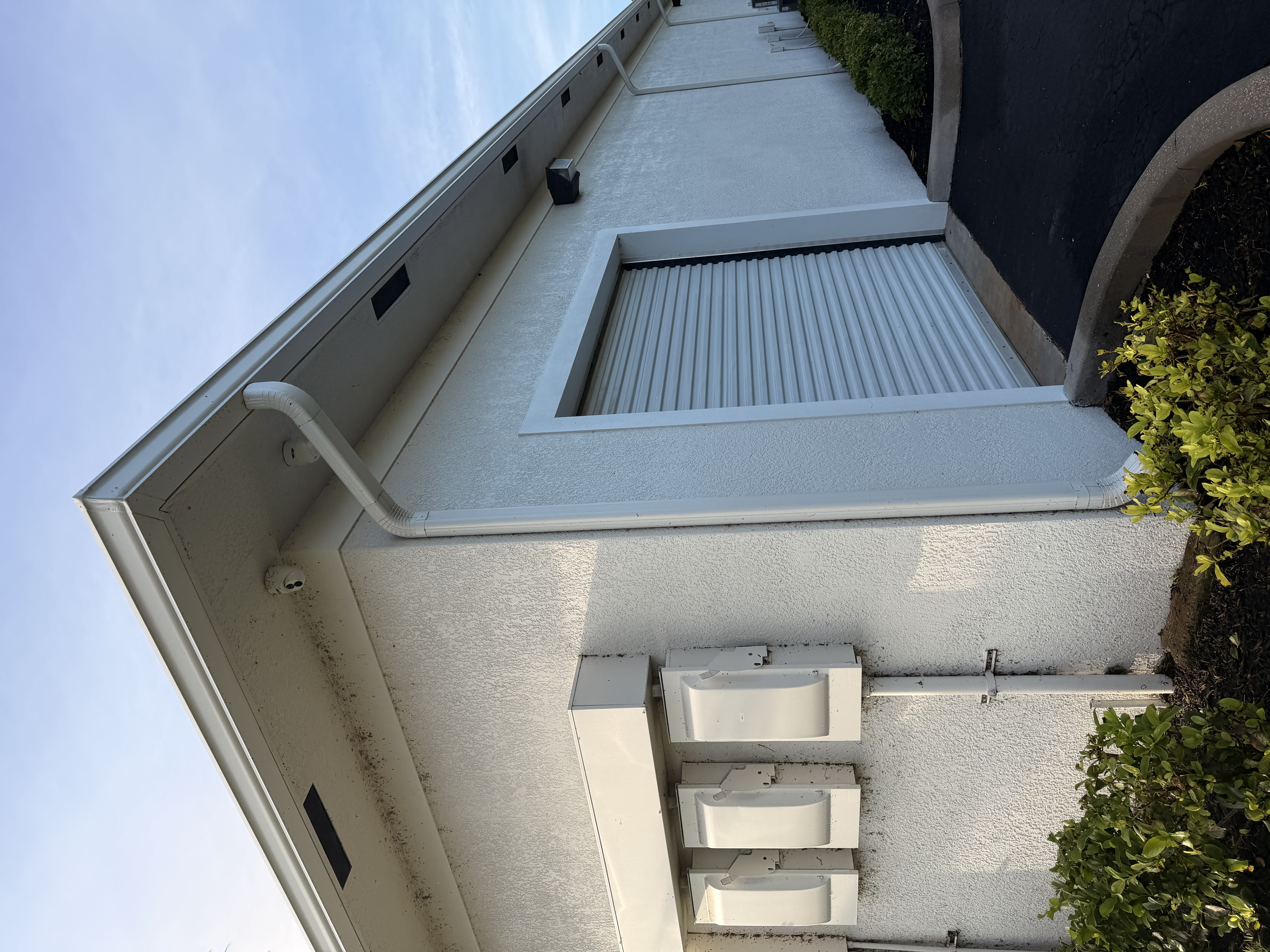 commercial building exterior before soft washing Treasure Coast FL