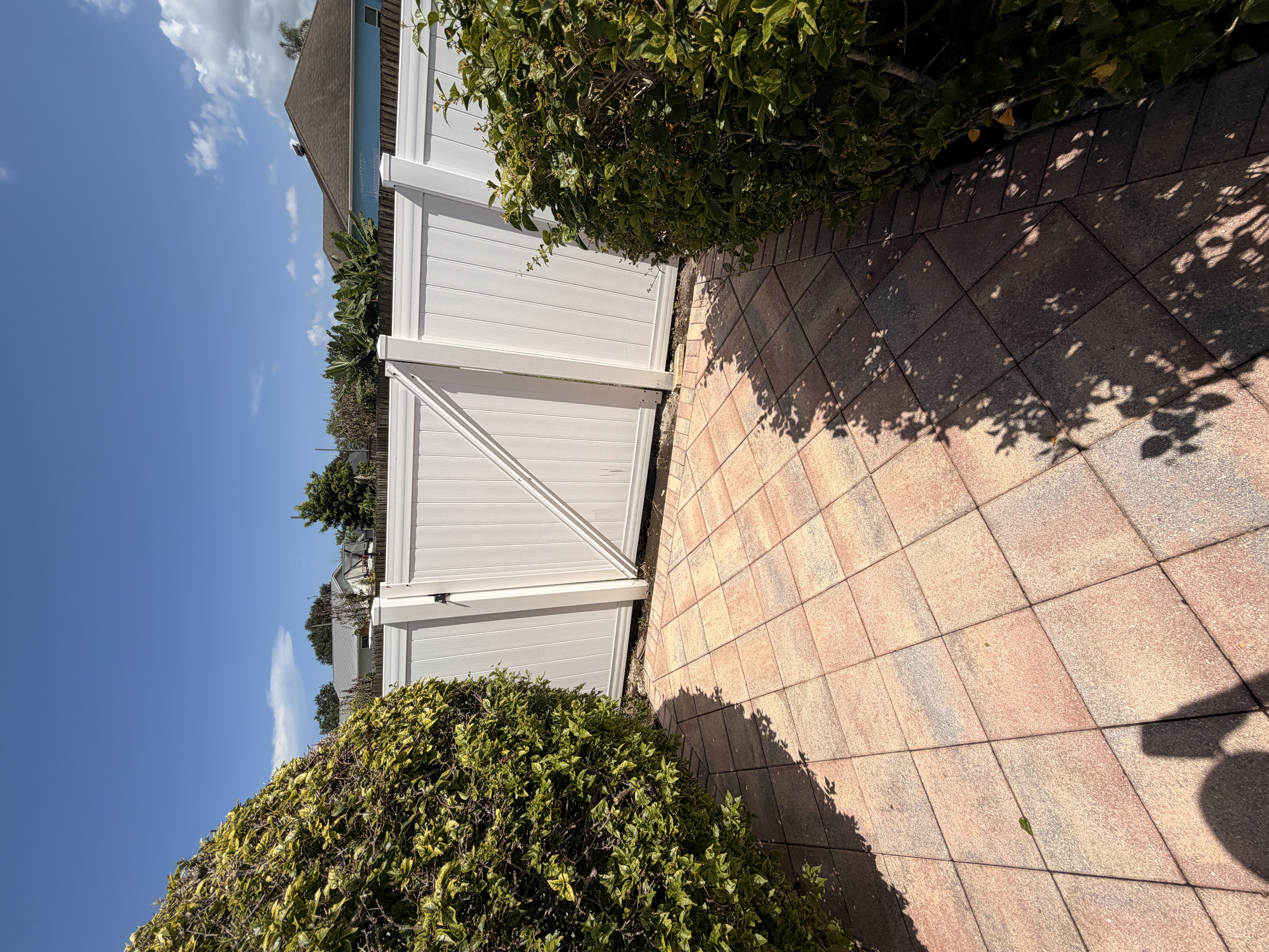 clean white vinyl fence after soft washing Port Saint Lucie FL